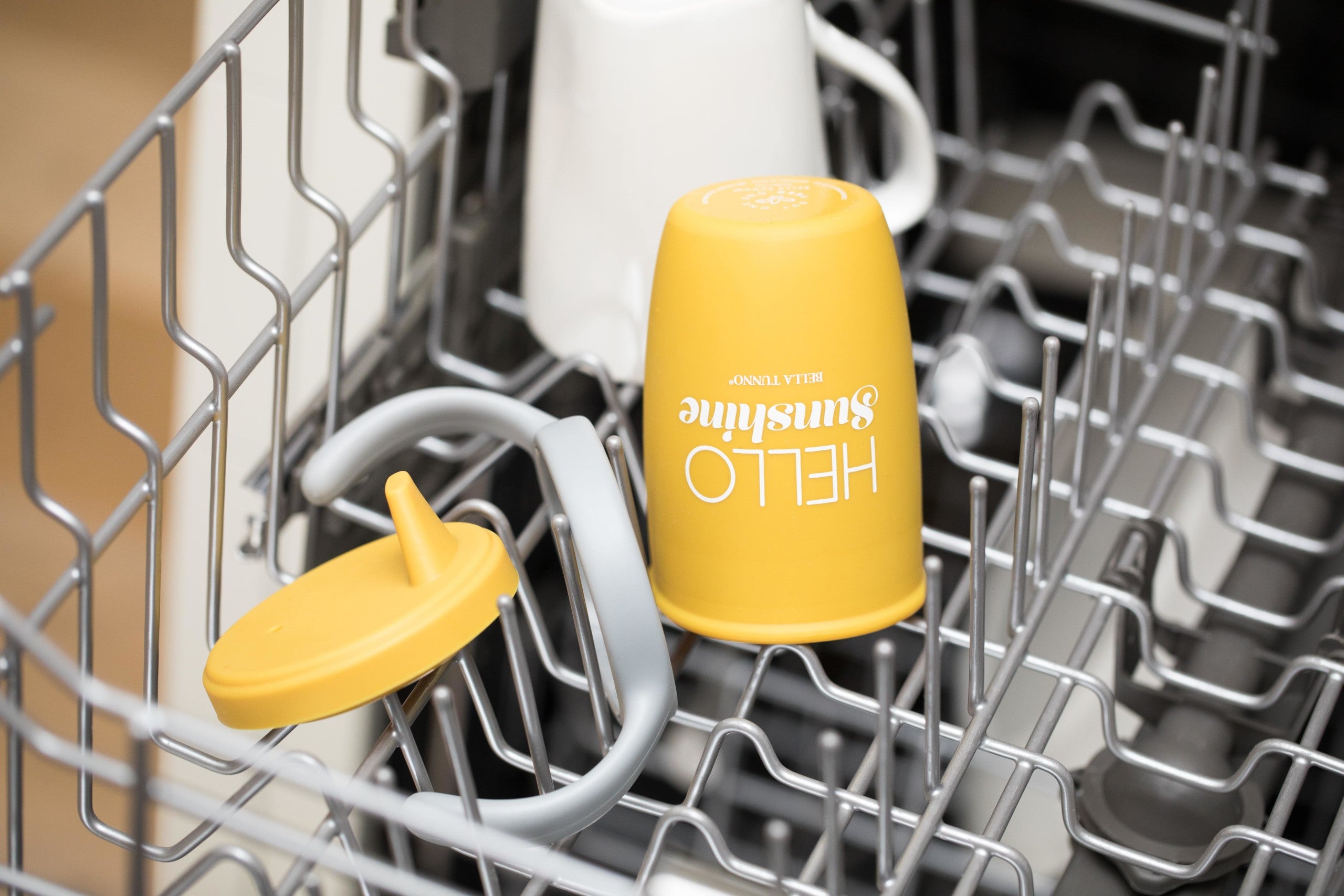 Hello Sunshine Happy Sippy Cup by Bella Tunno in a dish washing tray
